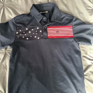 Travis Mathew youth Navy Polo Shirt with American Flag Design